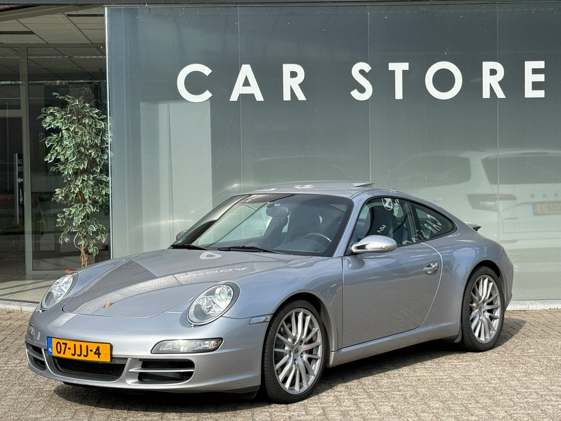 Porsche 911 3.8 Carrera S Schuifdak|Bose|Memory|Navigatie, Automaat, Dealer onderhouden, Achterwielaandrijving, Gebruikt