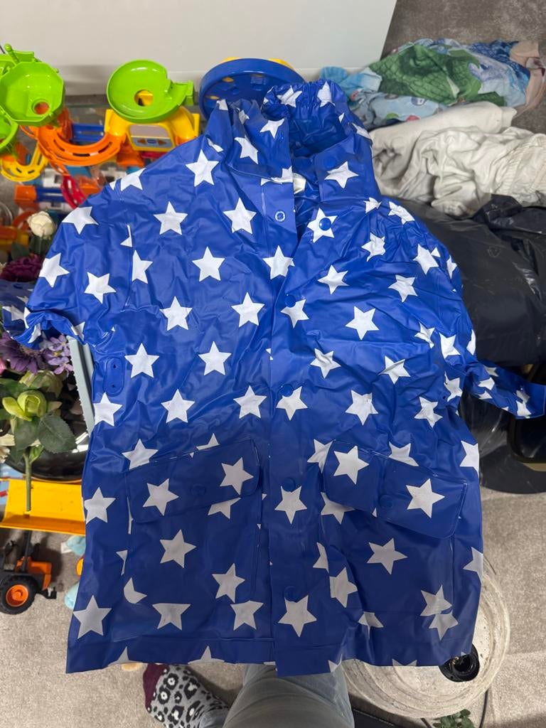 Nieuwe HEMA regenjas blauw met sterren, maat 98/104, Ophalen of Verzenden, Nieuw, Jongen of Meisje