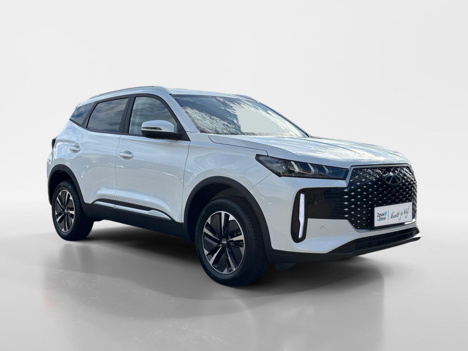 Chery Tiggo 4 1.5L HEV Unique | Nieuw | 7 Jaar Garantie |, Auto's, Verwarmde buitenspiegels, 1498 cc, 4 cilinders, Bedrijf