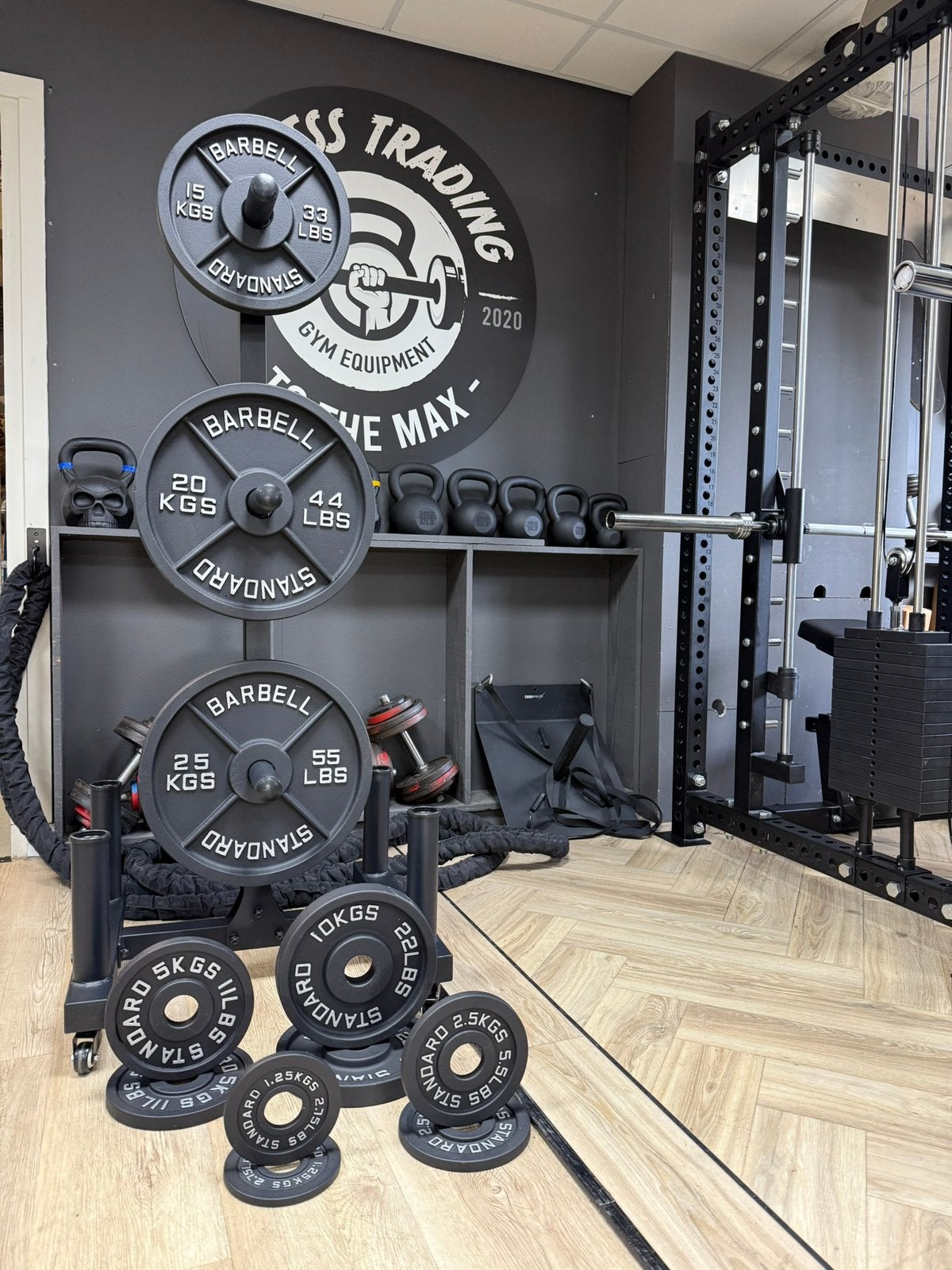 Gietijzeren plates/schijven, nieuwe zwarte fitness gewichten, Sport en Fitness, Nieuw, Ophalen of Verzenden, ., Info@fitnesstradingtothemax.nl