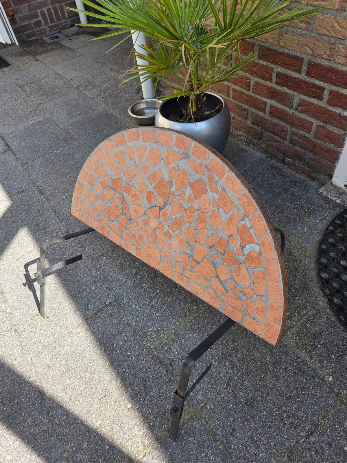 Balkon hangtafel, Ophalen