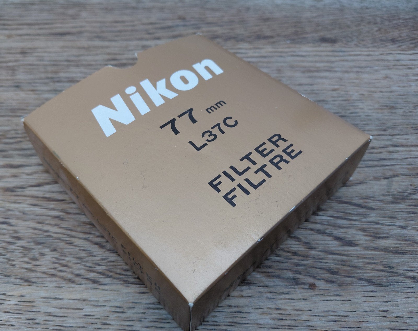 Nikon UV filter 77 mm, Audio, Tv en Foto, Fotocamera's Analoog, Ophalen of Verzenden, Nieuw, Spiegelreflex, Nikon