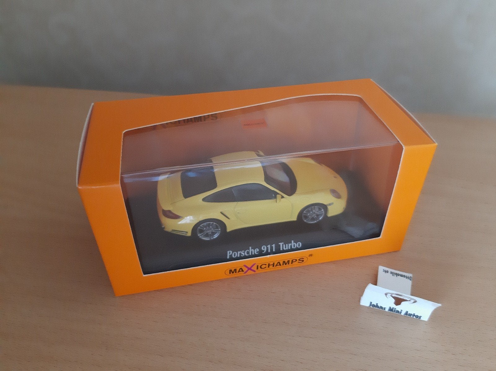 Porsche 911 Turbo 2009 Racing Yellow van Maxichamps 1:43, Hobby en Vrije tijd, Overige merken, Auto, Nieuw, Ophalen of Verzenden