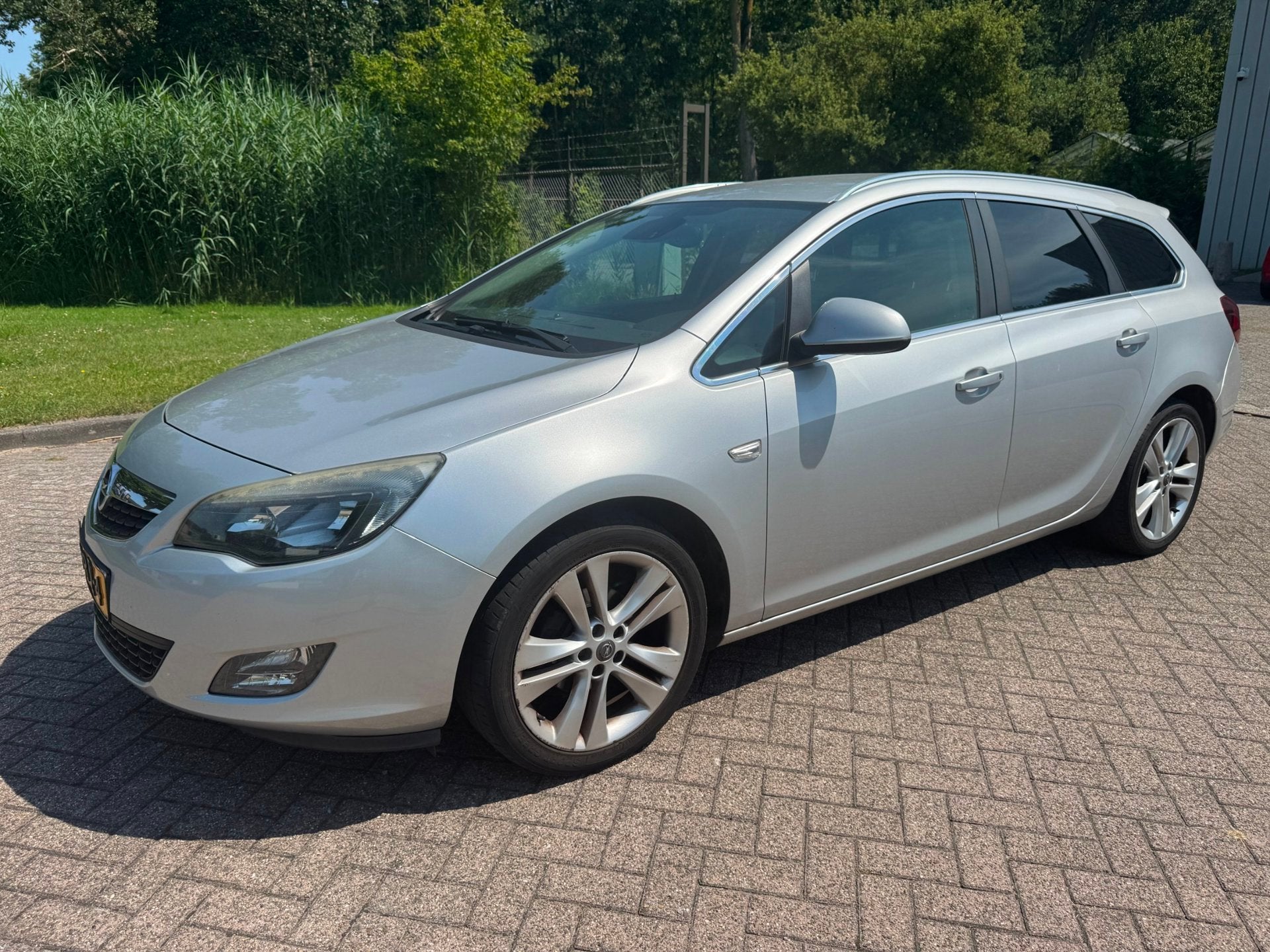 Opel Astra Sports Tourer 1.4 Turbo Sport/AUT/CLIMA/CRUISE/NA, Auto's, Euro 5, Gebruikt, 4 cilinders, Origineel Nederlands