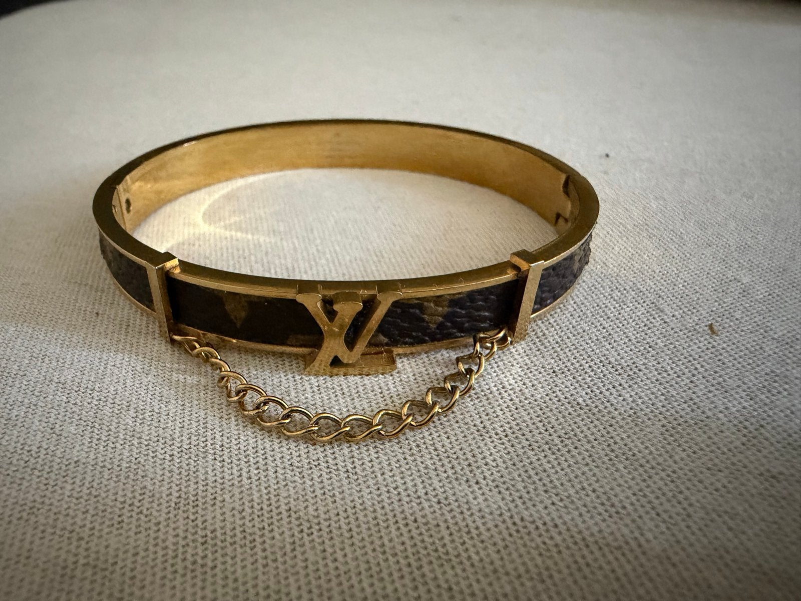 Stijlvolle en stevige Louis Vuitton armband, Ophalen of Verzenden, Gebruikt, Goud, Overige materialen