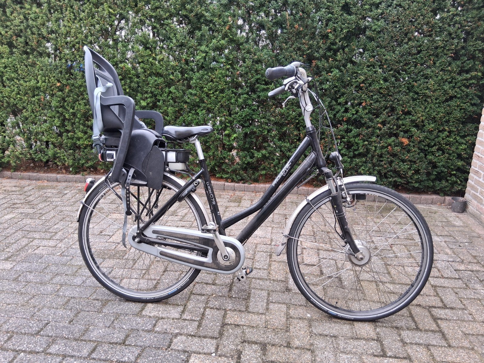 Elektrische damesfiets Promovec met kinderzitje en oplader, Ophalen of Verzenden, Zo goed als nieuw, Overige merken