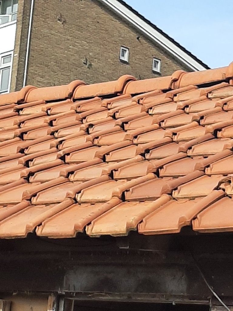 Rode dakpannen., Doe-het-zelf en Verbouw, Ophalen, Gebruikt, Steen of Klei, 15 m² of meer