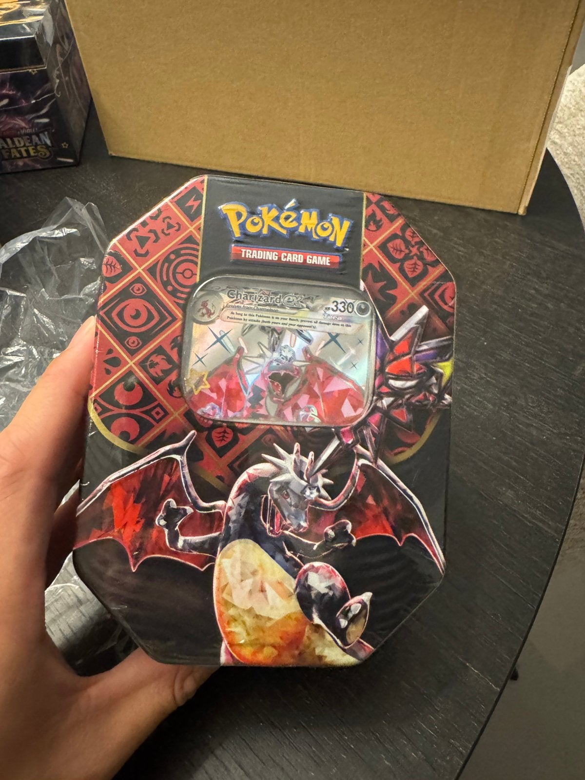 Paldean Fates charizard Tin, Ophalen of Verzenden, Zo goed als nieuw
