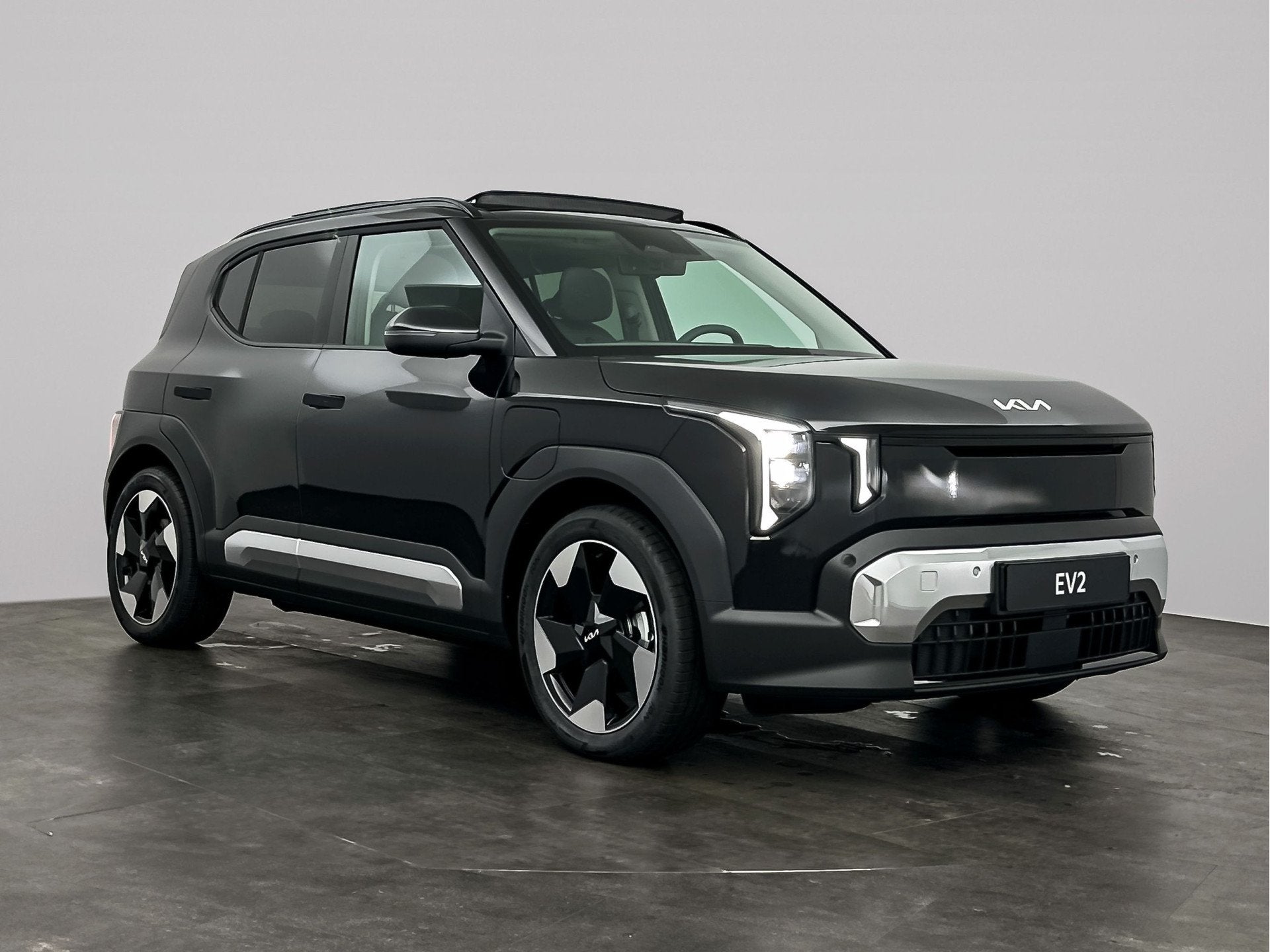 Kia EV2 Demo edition 42.2 kWh 4p. | premium audio | schuif-, Auto's, 4 stoelen, Leder en Stof, Zwart, Nieuw