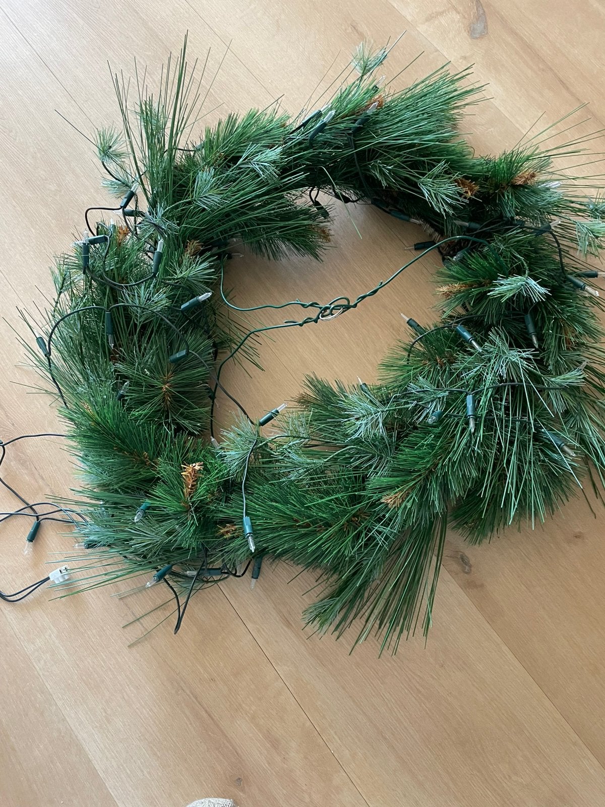 Kerstkrans, Ophalen
