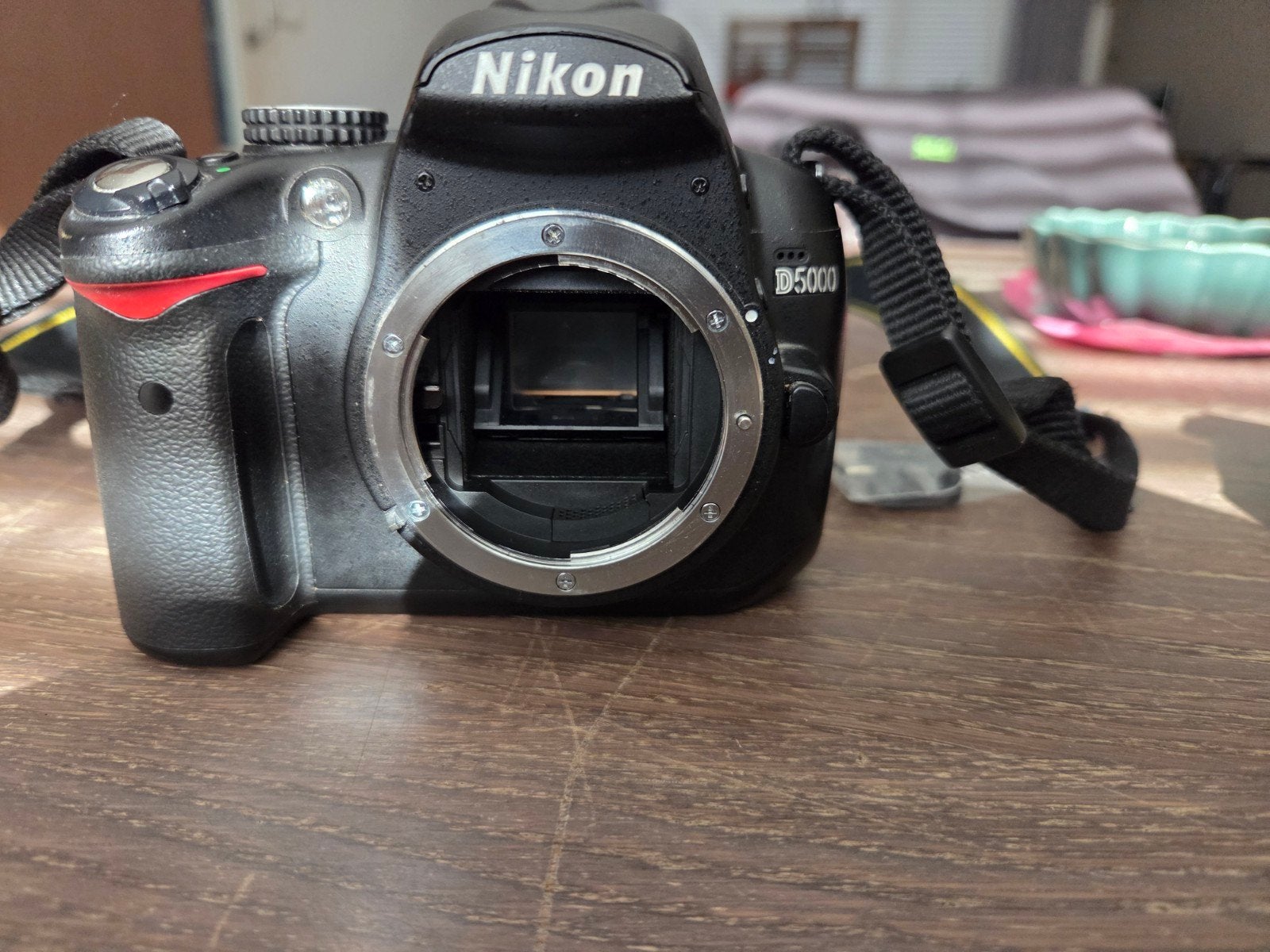 Nikon D5000 body met 2 accu's en oplader, Audio, Tv en Foto, Fotocamera's Digitaal, Ophalen of Verzenden