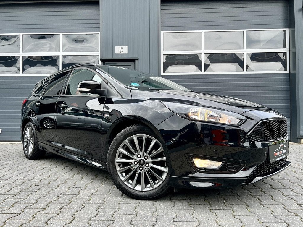 Ford Focus Wagon 1.0 ST-Line *CARPLAY*CAMERA*125PK*VOL, Automatische klimaatregeling, Gebruikt, Euro 6, Zwart