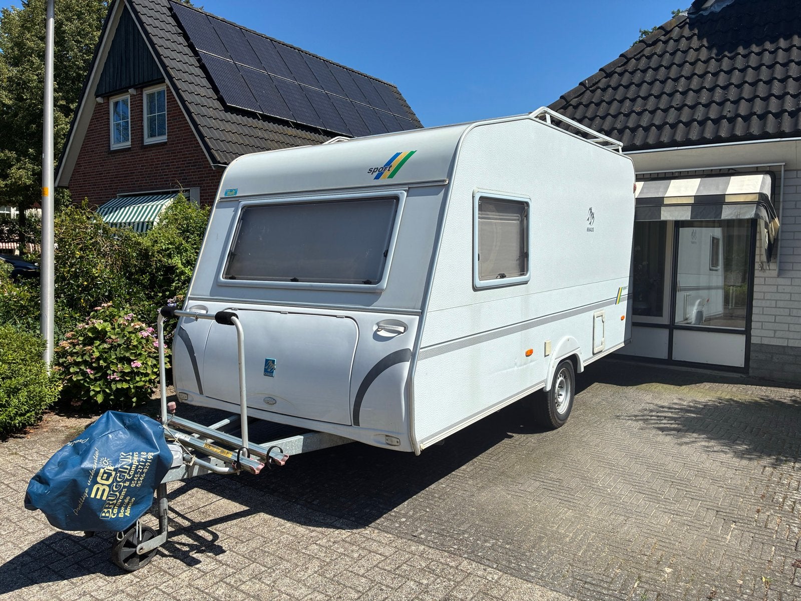 Complete Knaus Sport caravan - Te bezichtigen in Goor, Omvormbare zithoek, Treinzit, Particulier, 5 tot 6 meter