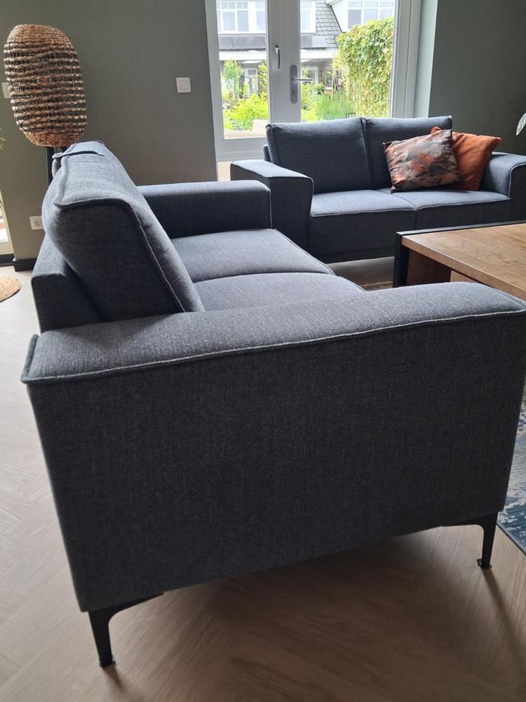 2,5 en 2 zitsbank in jeans kleur., Ophalen, Gebruikt, Minder dan 75 cm, 150 tot 200 cm