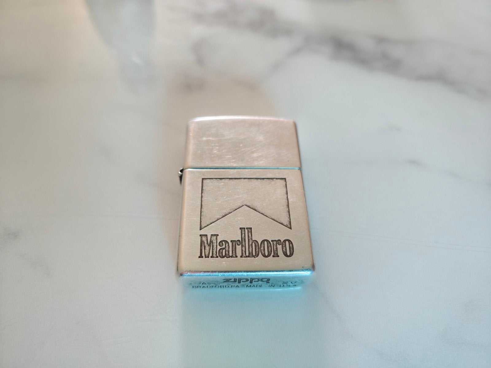 Zippo Marlboro 1999, Ophalen of Verzenden, Gebruikt, Aansteker