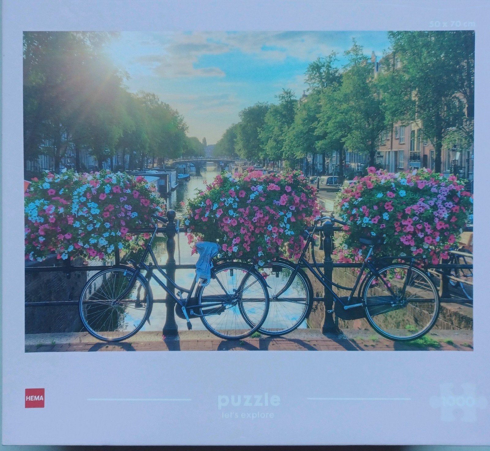 puzzel Amsterdam, fietsen op brug, Ophalen of Verzenden, 500 t/m 1500 stukjes, Zo goed als nieuw
