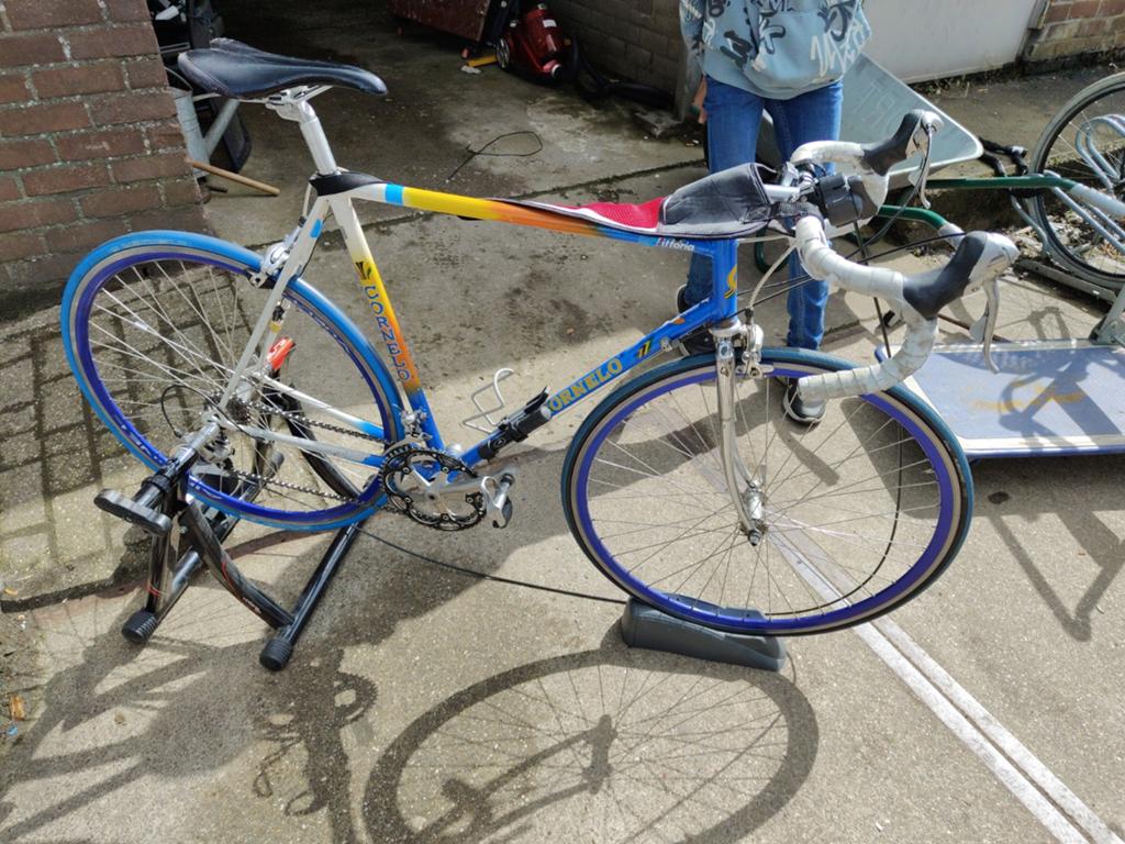 Cornelo racefiets met Elite fietstrainer, Ophalen
