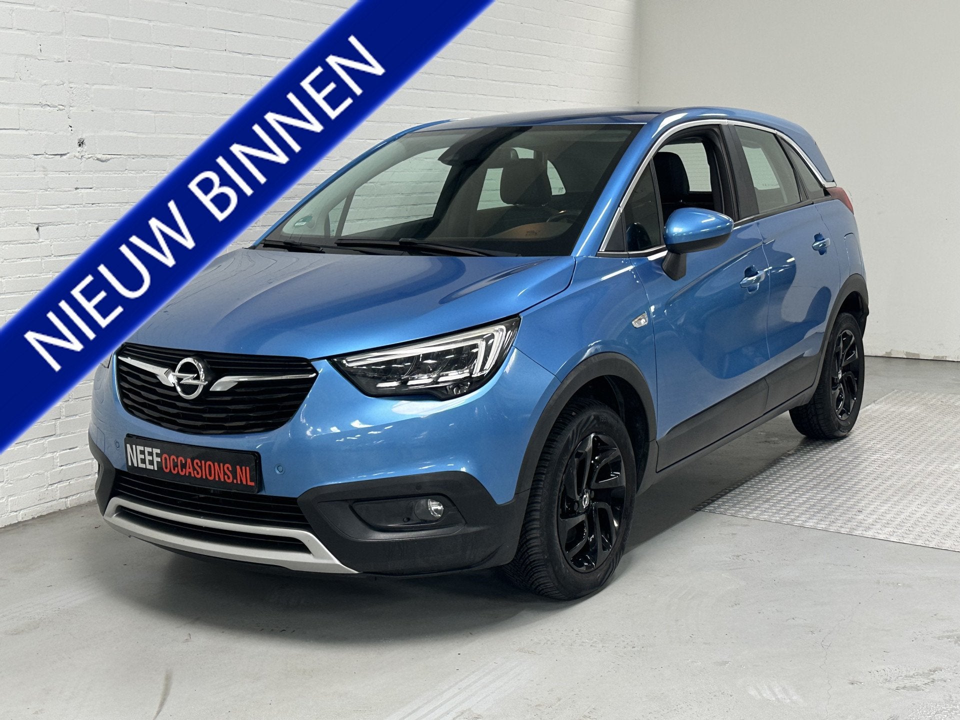 Opel Crossland X 1.2 Turbo Innovation CLIMA // CRUISE // NAV, Auto's, Gebruikt, Blauw, Leder en Stof, Bedrijf