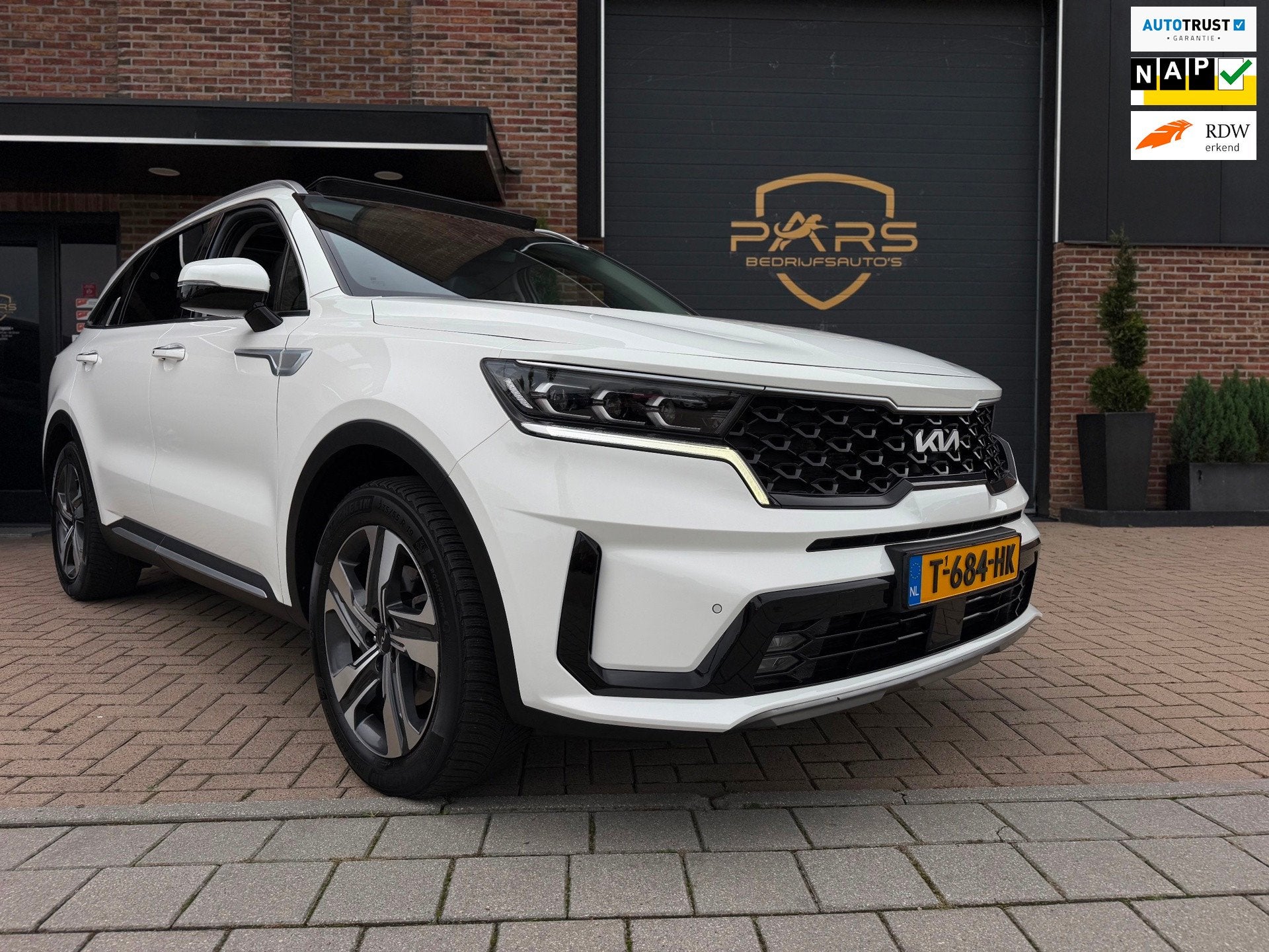 Kia Sorento 1.6 T-GDI 180PK Hybrid 2WD DynamicPlusLine 7p Au, Auto's, Dealer onderhouden, Gebruikt, 4 cilinders, Wit