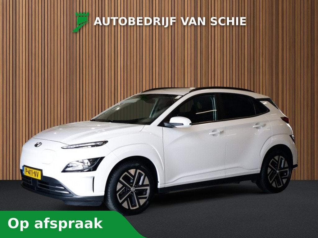 Hyundai Kona EV Comfort 64 kWh 3-Fase 1e-Eig. & Dealer-Onder, Auto's, 12 maanden, Gebruikt, Zwart, Verwarmde buitenspiegels