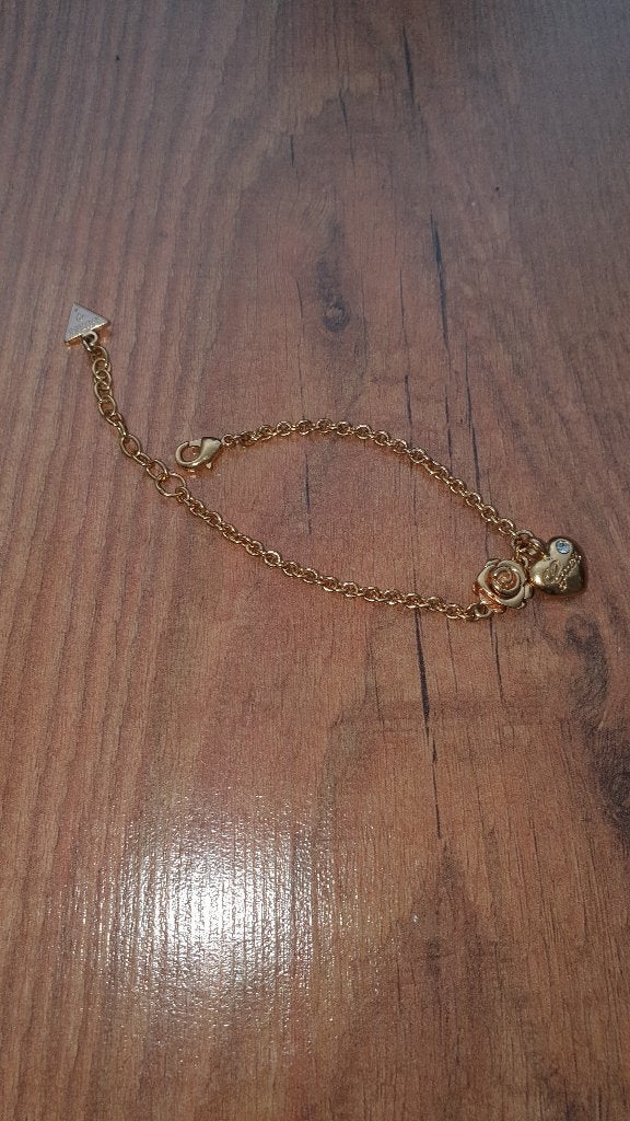 Sieraden; Guess goudkleurige armband, Ophalen, Zo goed als nieuw, Goud