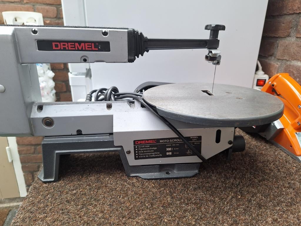 Dremel Moto-Scroller figuurzaag, Ophalen