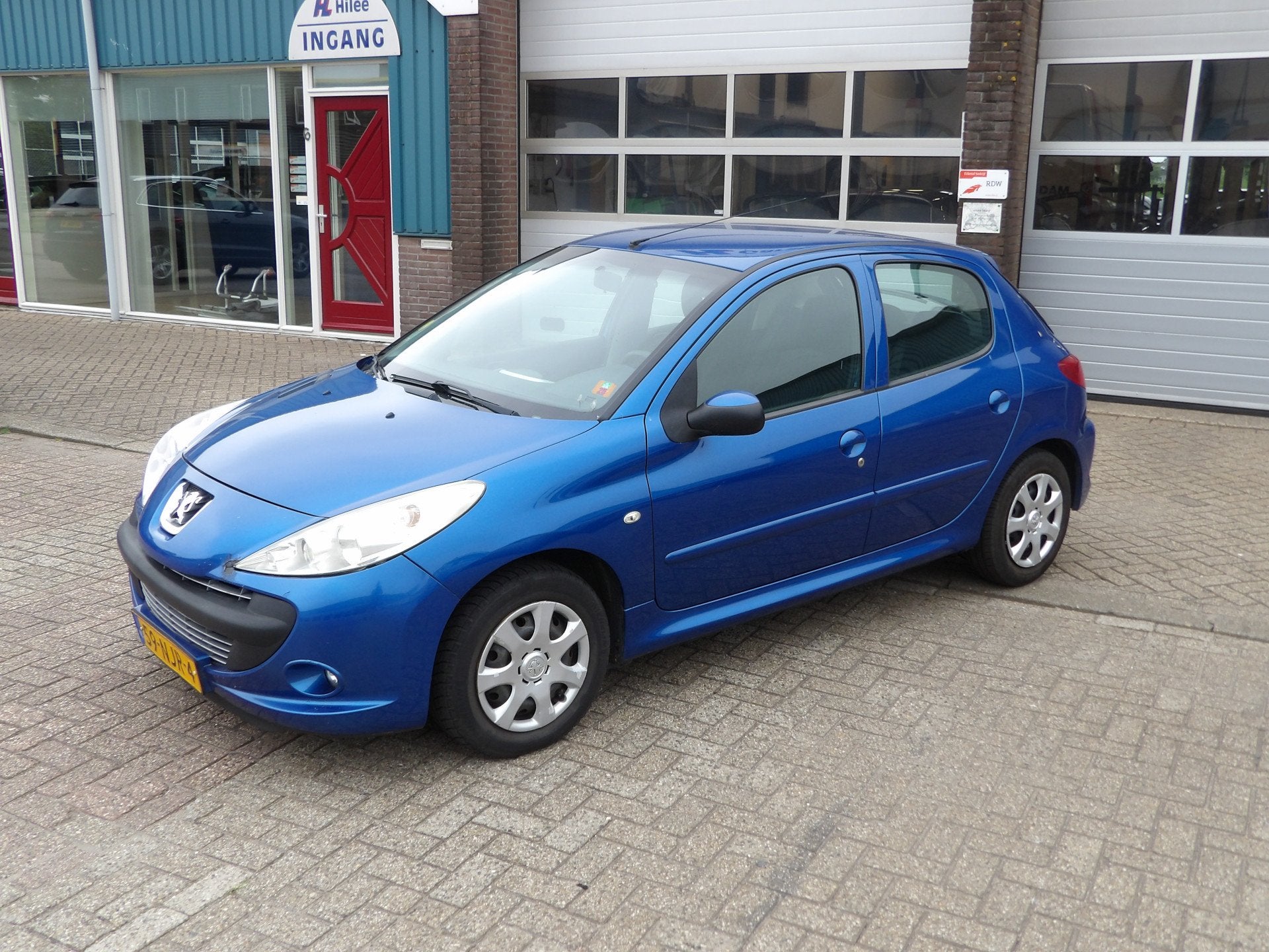Peugeot 206+ 1.4 Urban Move (bj 2010), Auto's, Peugeot, Voorwielaandrijving, 206+, 31 €/maand, Blauw