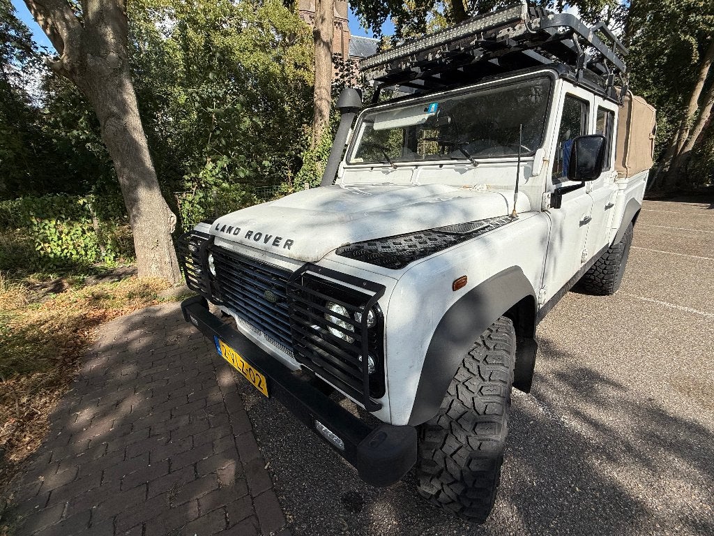 Land Rover Defender 130  2.4 D 2011, Auto's, Stof, Land Rover, Zwart, 4 cilinders
