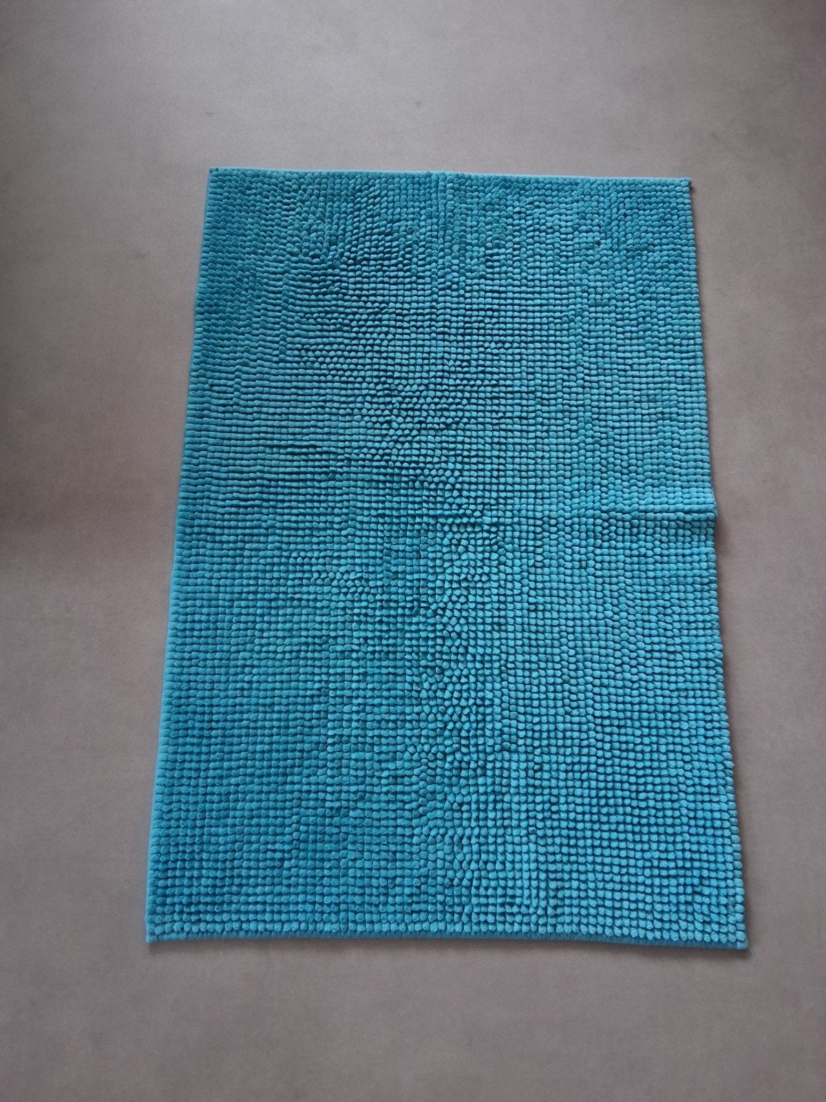 Turquoise badmat 60x90 cm, Ophalen of Verzenden, Gebruikt, Handdoek