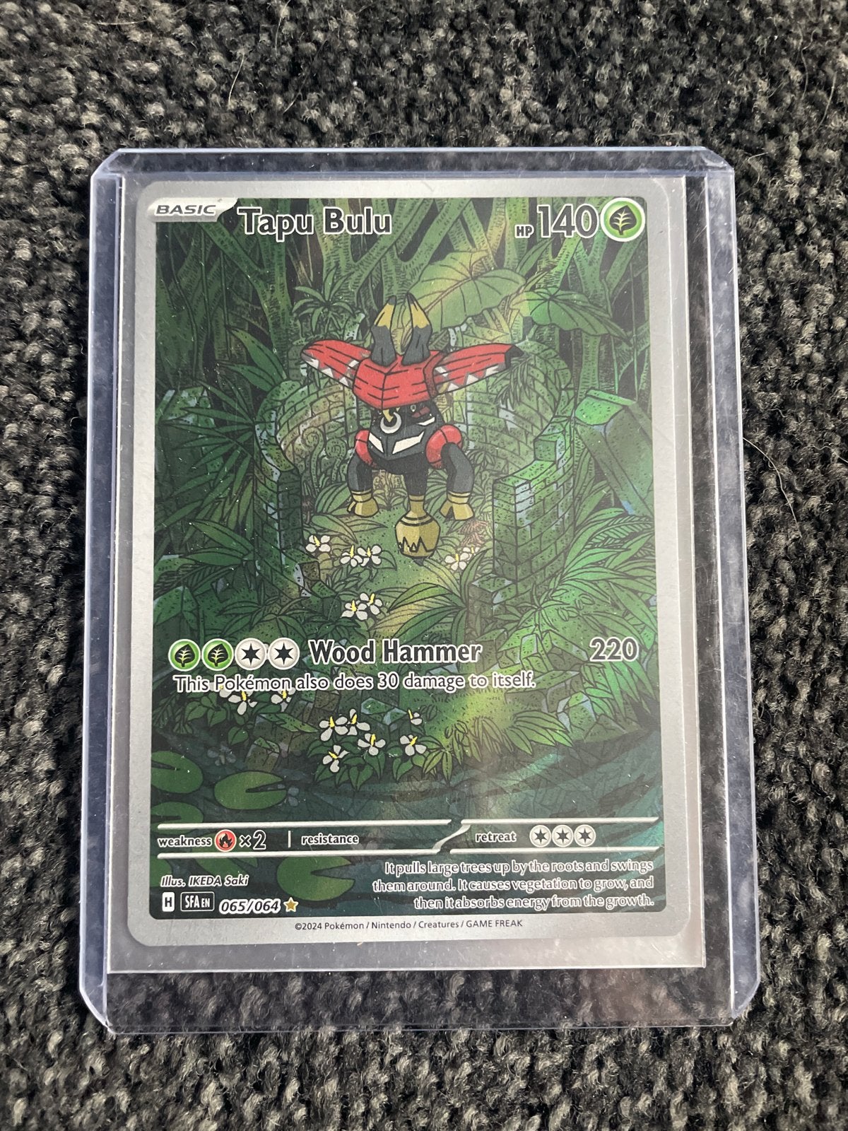 Tapu Bulu Pokémon Kaart - Zeldzaam en in Topstaat!, Ophalen of Verzenden, Zo goed als nieuw, Losse kaart