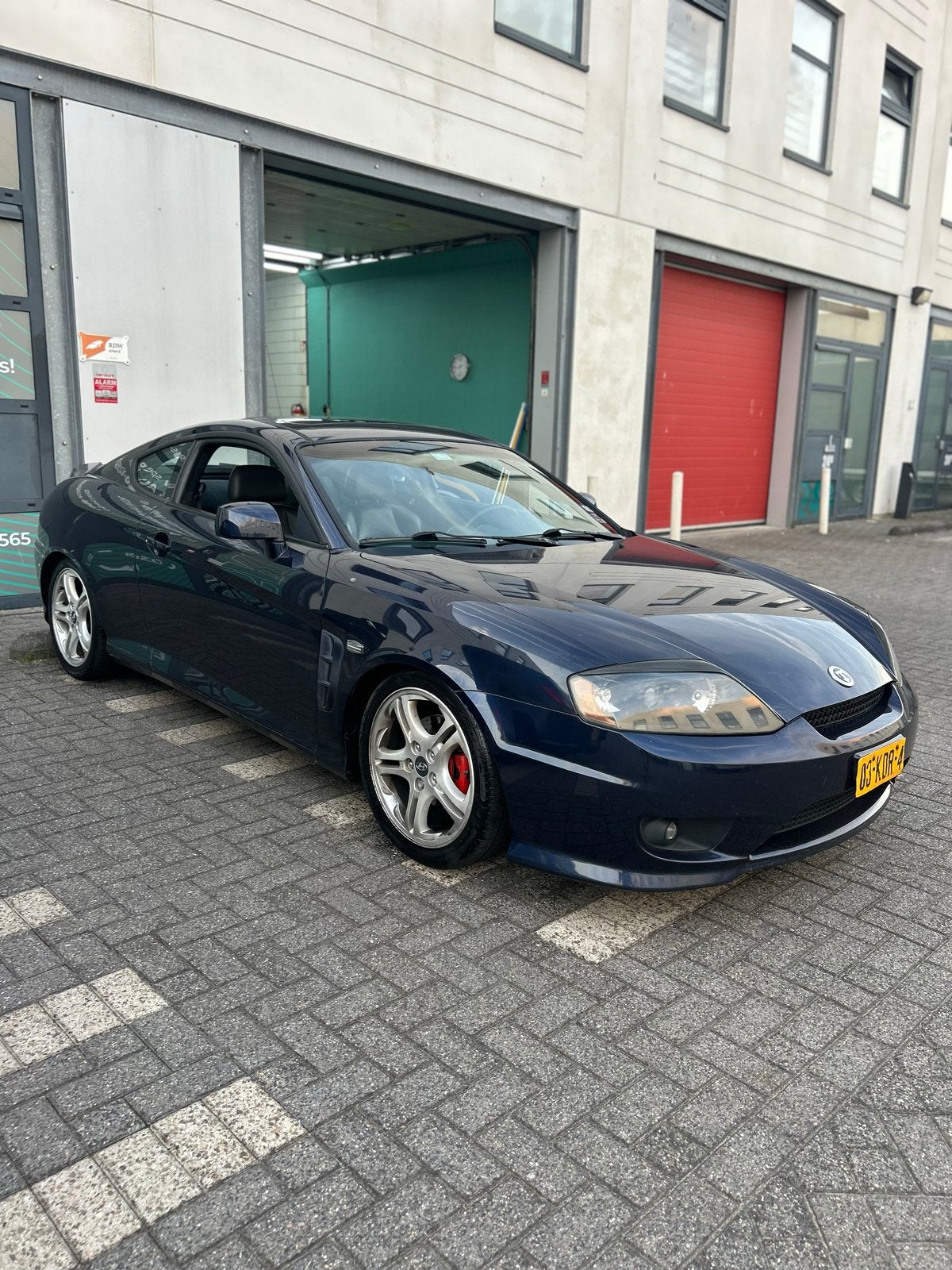 Hyundai coupé 2.7L V6 2005 Blauw, Voorwielaandrijving, 1380 kg, Zwart, Handgeschakeld
