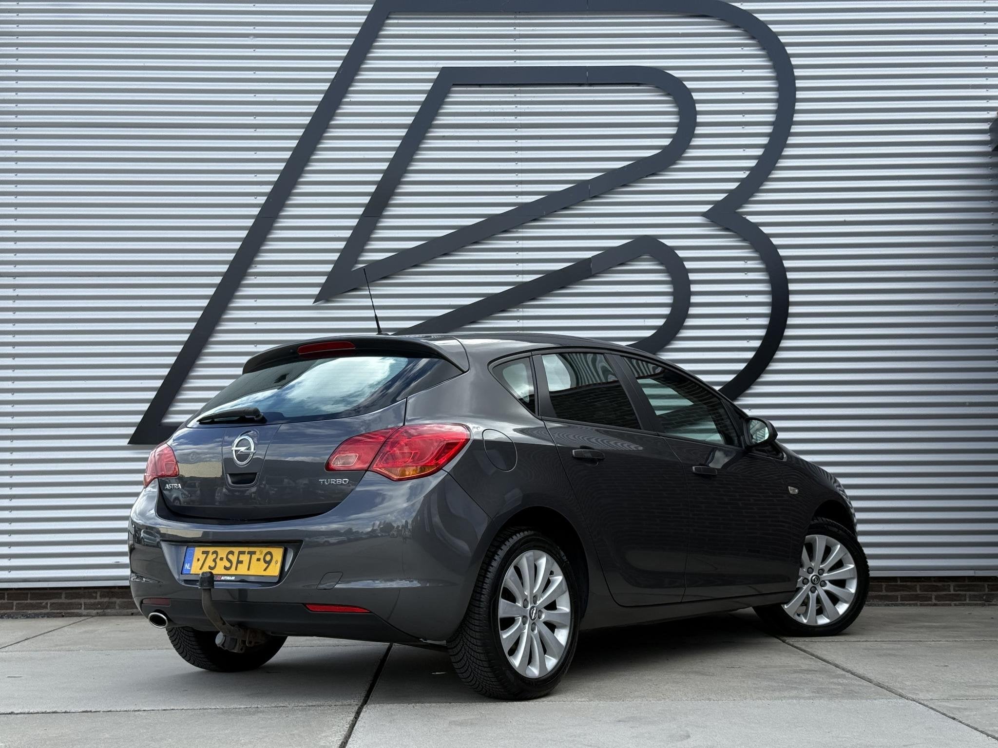 Opel Astra 1.4 Turbo Edition 2e Eigenaar|Trekhaak|Airco|Crui, Auto's, Euro 5, Gebruikt, 4 cilinders, 1353 kg