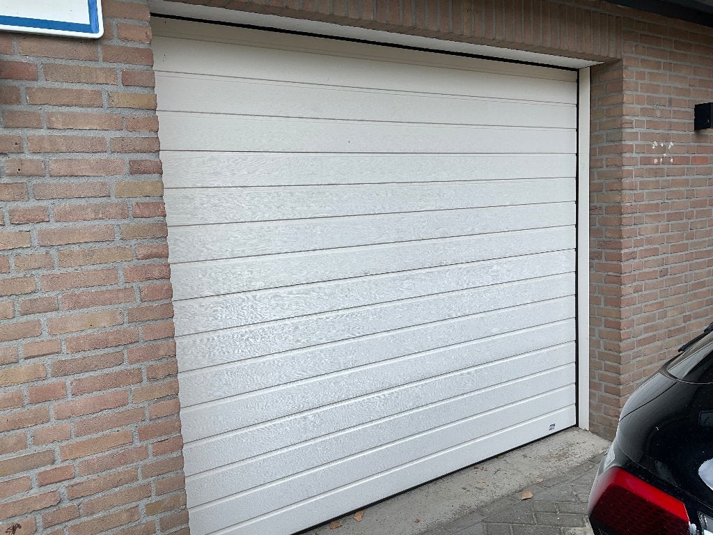 Elektr garagedeur novoferm sectionaaldeur met tormatic motor, Ophalen, Kunststof, Gebruikt, Garagedeur
