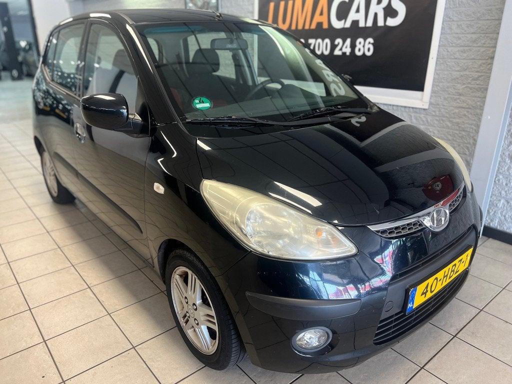 Hyundai I10 1.1 i-Catcher| Airco | 5-deurs | LMV | Elektr. |, Auto's, Hyundai, Voorwielaandrijving, Gebruikt, 31 €/maand, 4 cilinders