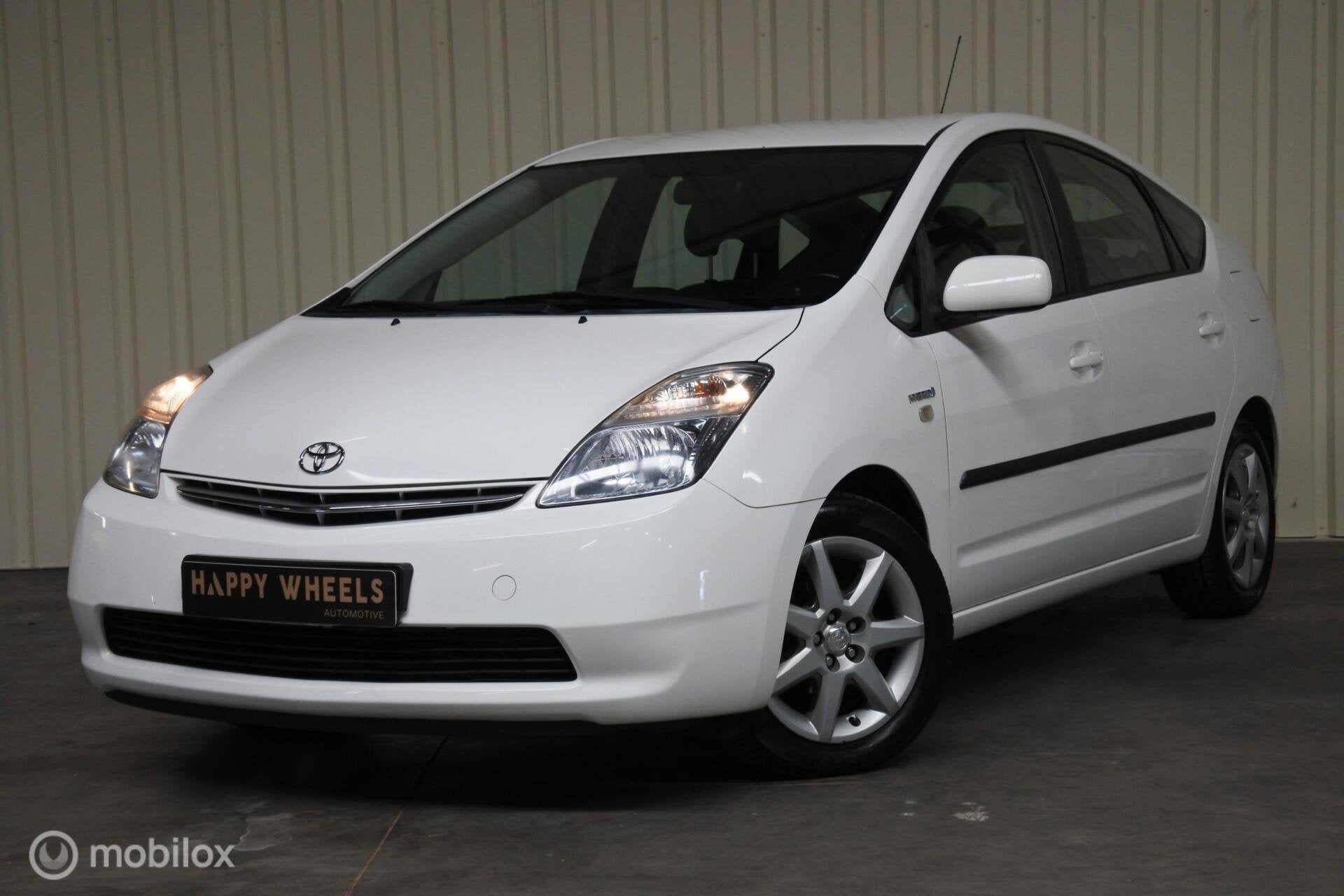 Toyota Prius I 1.5 VVT-i I Airco I Cruise I Parkeerhulp, Gebruikt, Zwart, 4 cilinders, Met garantie (alle)