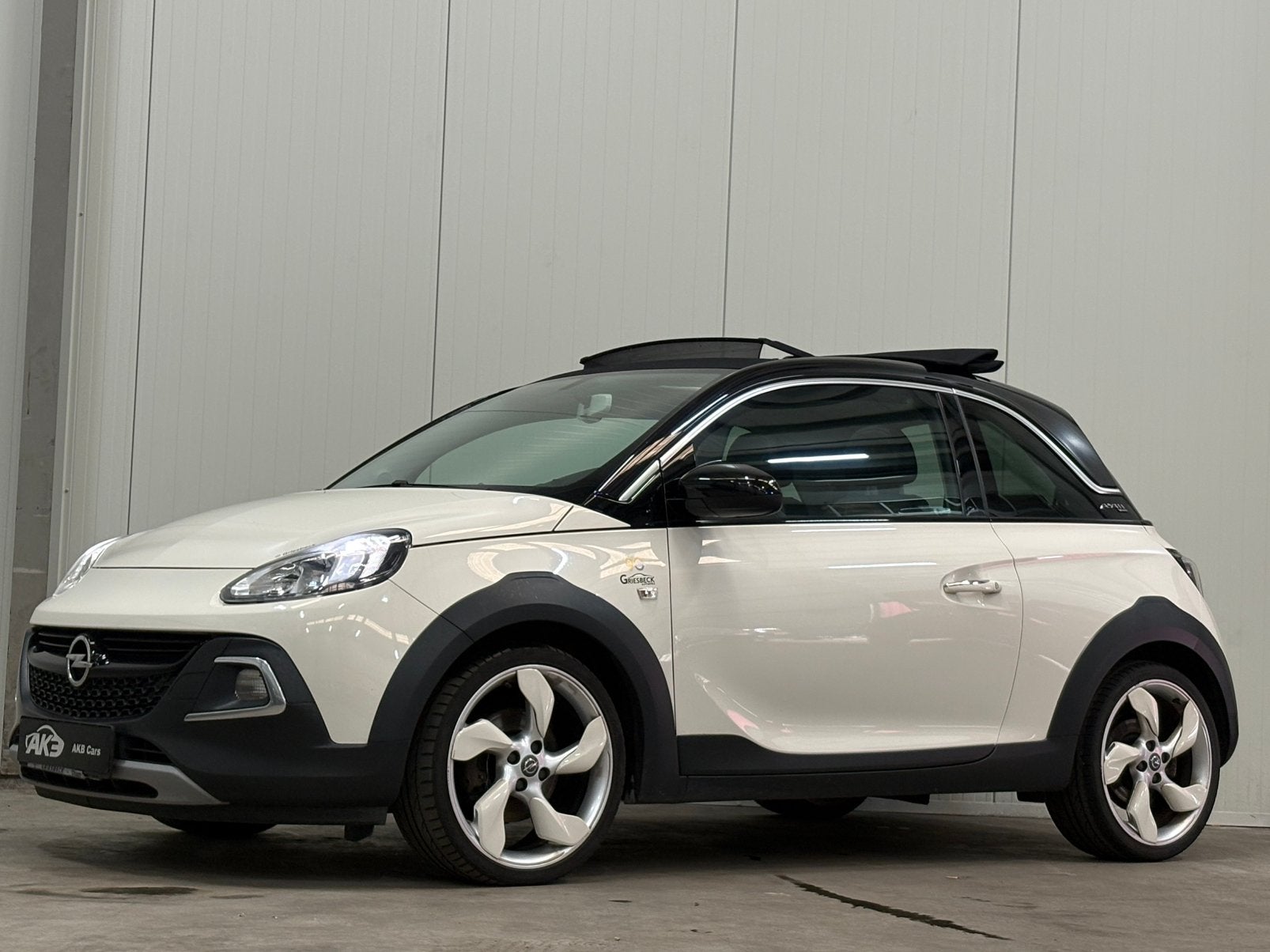 Opel Adam Rocks 1.0 /AIRCO/OPENDAK/CRUISE/CARPLAY/GARANTIE/, Auto's, ADAM, Zwart, 4 cilinders, Leder en Stof
