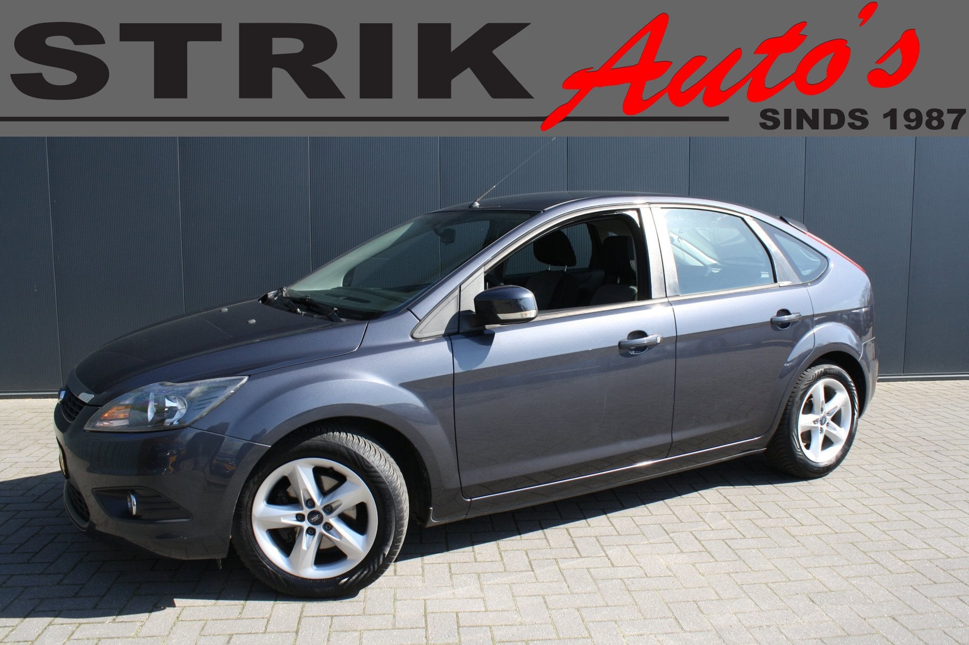 Ford Focus 1.6 Comfort - AIRCO - TREKHAAK, Gebruikt, Zwart, 4 cilinders, 620 kg
