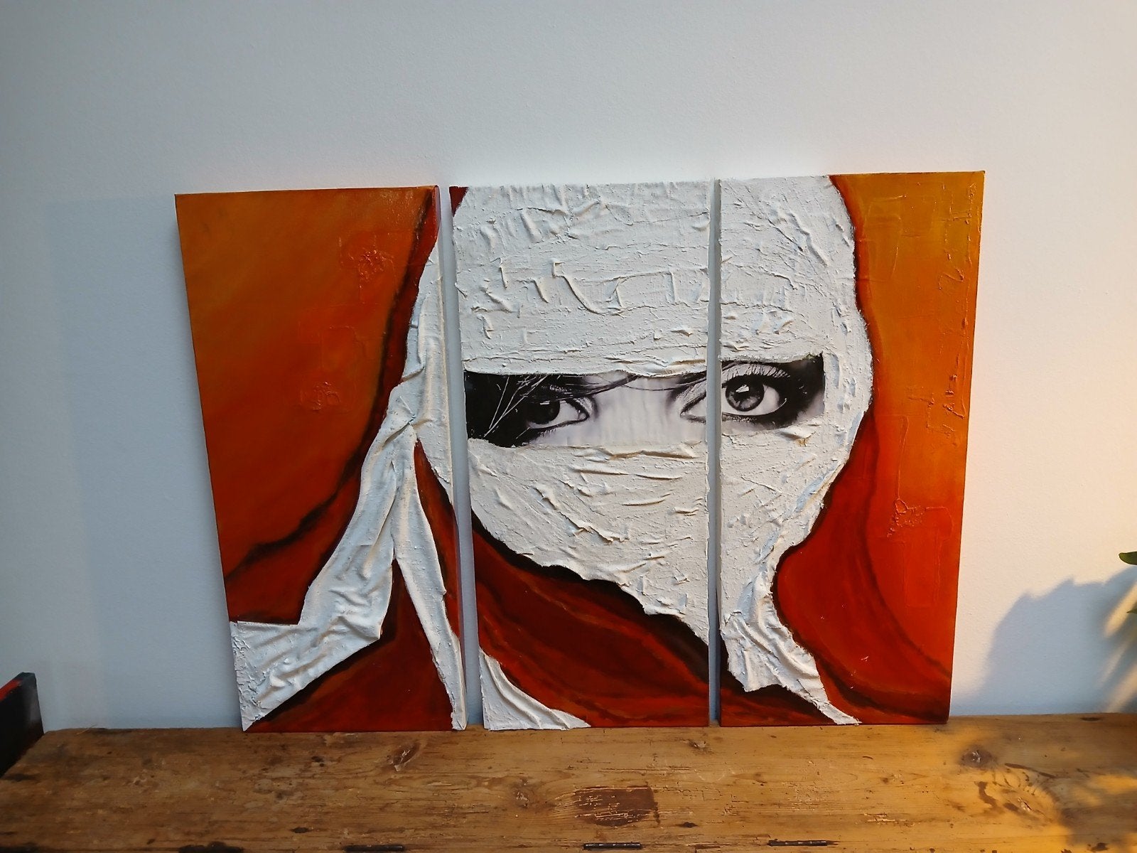 Modern drieluik schilderij: Vrouw met niqab, Ophalen