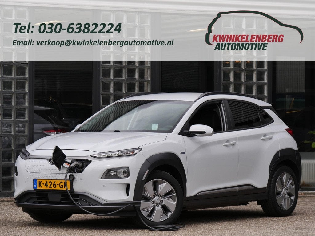 Hyundai Kona EV 64kWh PREMIUM/ LEER/ ELEKT. STOELEN/ WARMTEP, Auto's, Hyundai, Gebruikt, Zwart, Wit, Leder