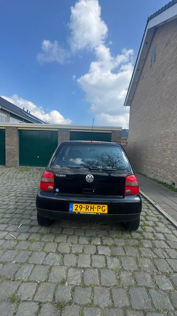 Volkswagen Lupo 1.4 44KW 2005 Zwart, Auto's, Voorwielaandrijving, 450 kg, 31 €/maand, 4 cilinders