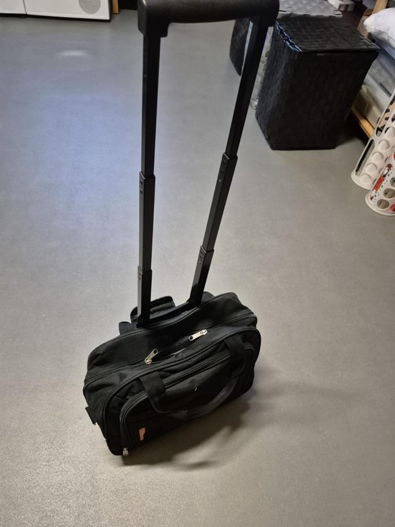 Laptop werktas met wieltjes en uitschuifbare handgreep, Ophalen