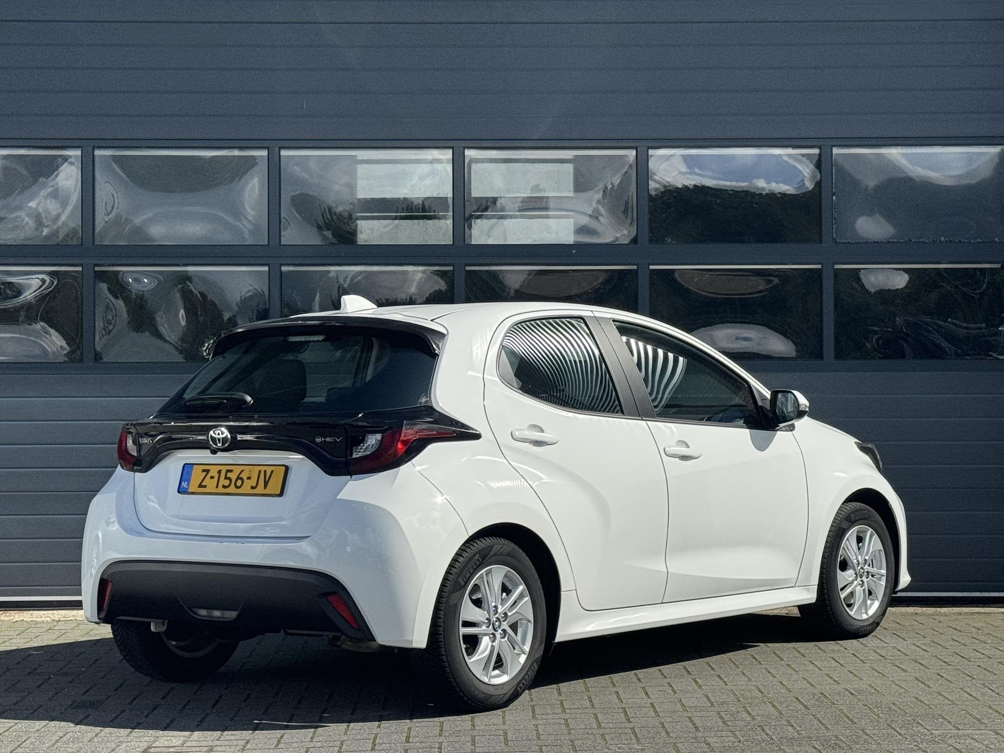 TOYOTA YARIS 1.5 HYBRID 115 ACTIVE I AUTOMAAT I APPLE CARPLA, Automatische klimaatregeling, Gebruikt, Met garantie (alle), Bedrijf