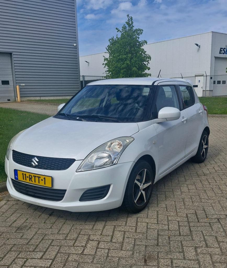 Suzuki Swift 1.2 5-D 2011 Wit airco stoelverwarming, Auto's, Suzuki, Particulier, Swift, ABS, Airbags, Airconditioning, Automatische klimaatregeling