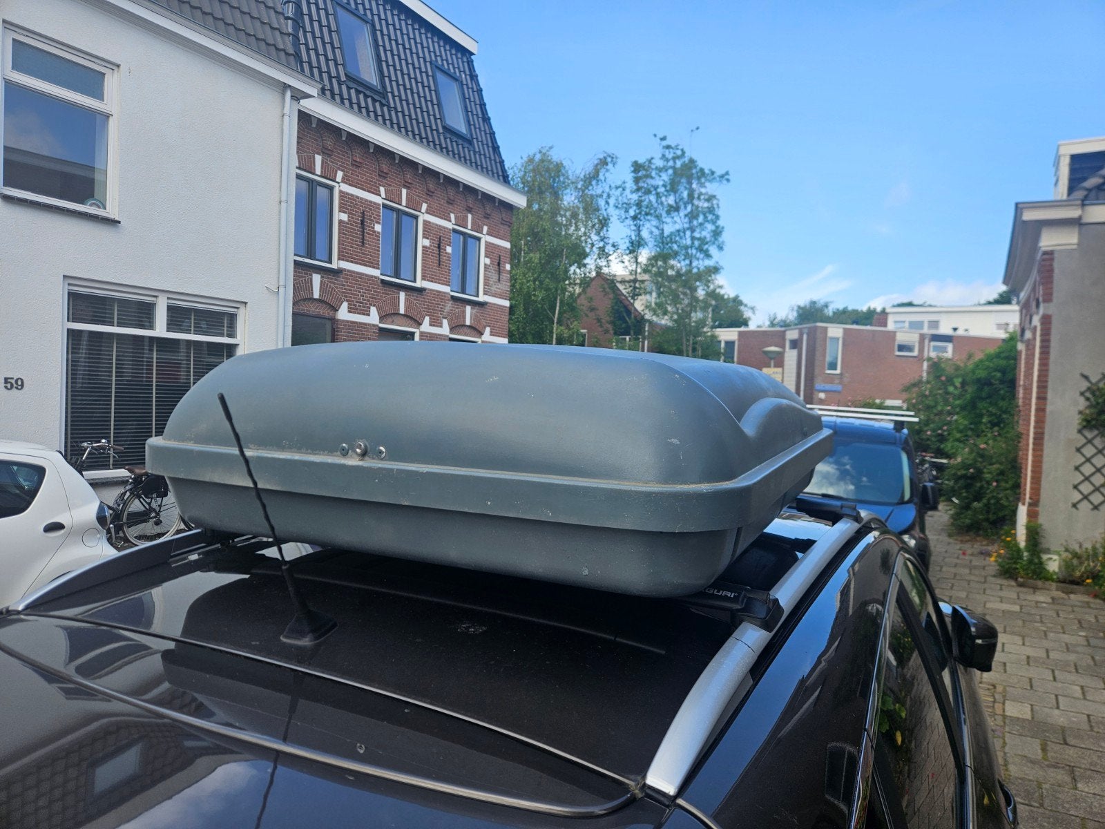 Gebruikte dakkoffer voor extra bagageruimte, Ophalen