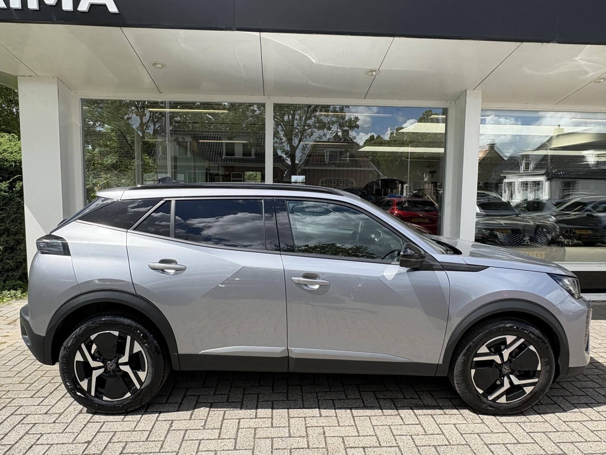Foto 3 van Peugeot 2008 1.2T 100pk Allure | Achteruitrijcamera | Naviga