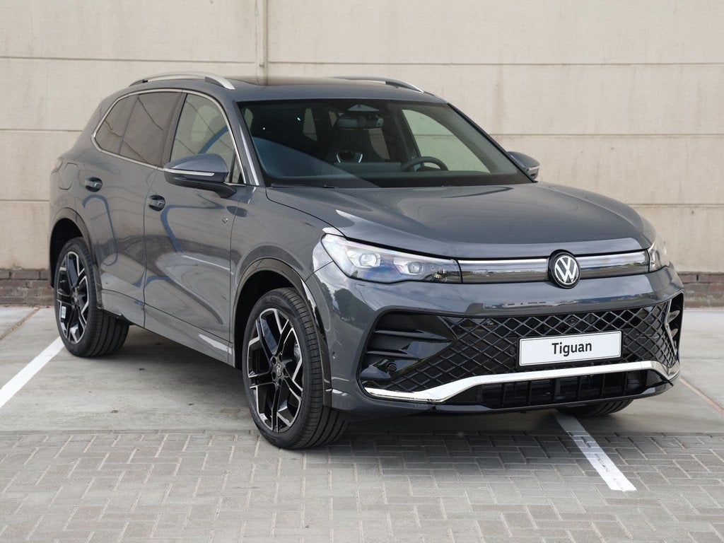 Volkswagen Tiguan R-Line Edition 1.5 eHybrid 272 PK | Naviga, Auto's, Volkswagen, Stof, 1498 cc, 4 cilinders, 2000 kg