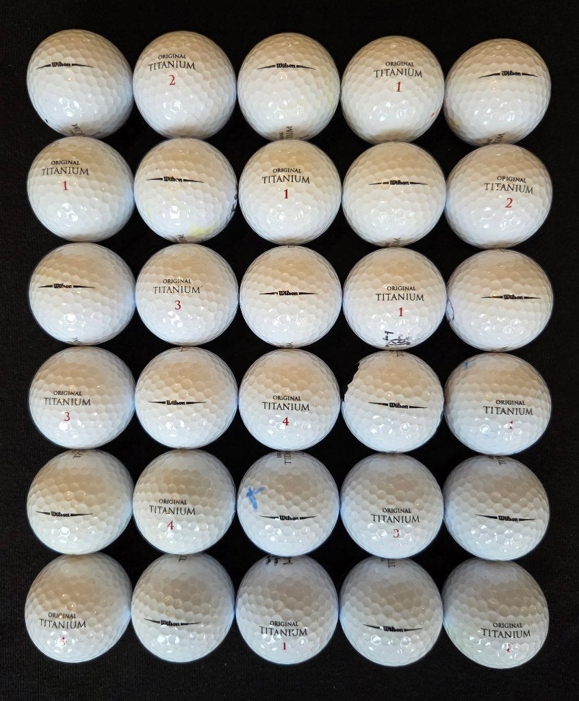 30 stuks mooie Wilson Titanium golfballen, Sport en Fitness, Golf, Ophalen of Verzenden, Zo goed als nieuw, Bal(len)