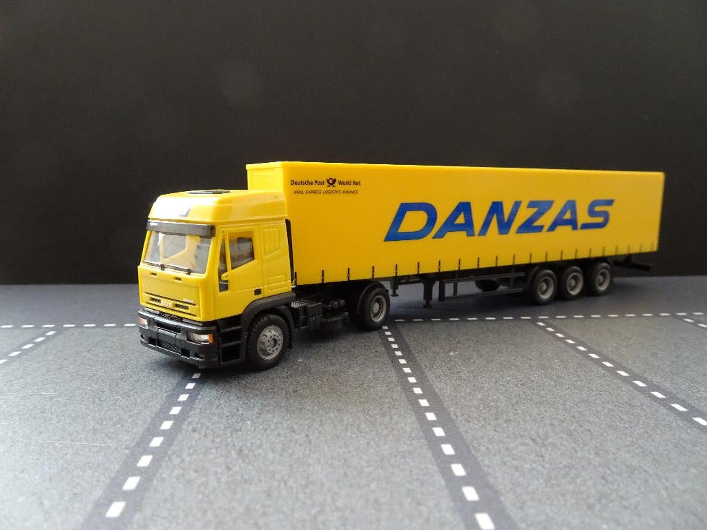 669 herpa iveco eurotech danzas deutsche post dhl 1:87 truck, Hobby en Vrije tijd, Ophalen of Verzenden, Zo goed als nieuw, Bus of Vrachtwagen