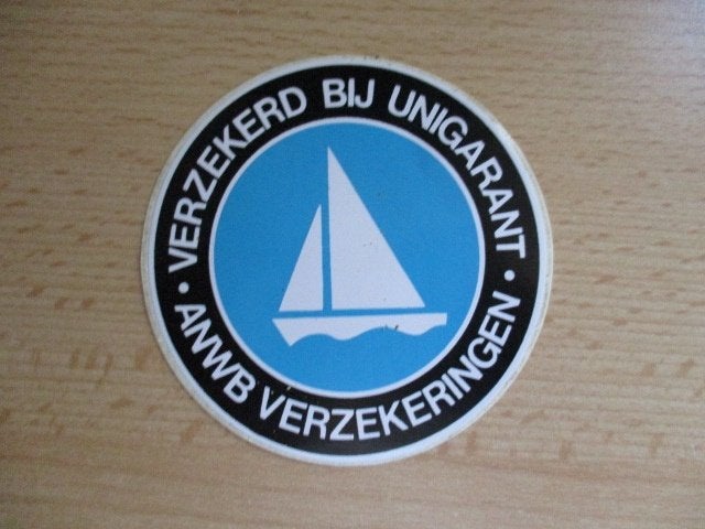 ANWB verzekeringen sticker verzekerd bij unigarant 9cm, Ophalen of Verzenden, Zo goed als nieuw, Bedrijf of Vereniging