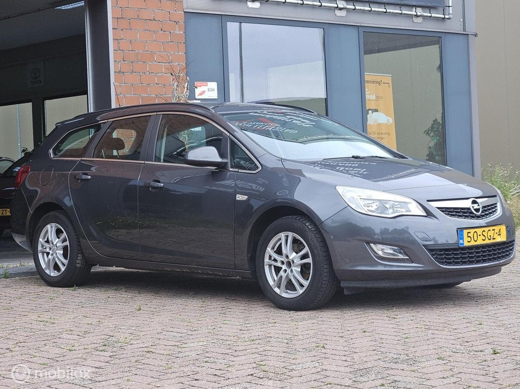 Opel Astra Sports Tourer 1.4 Edition, Auto's, Opel, Voorwielaandrijving, Euro 5, 101 pk, Gebruikt